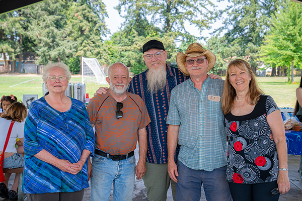 Lucille's Home Director Sharon with her husband and board member J.J. and various volunteers